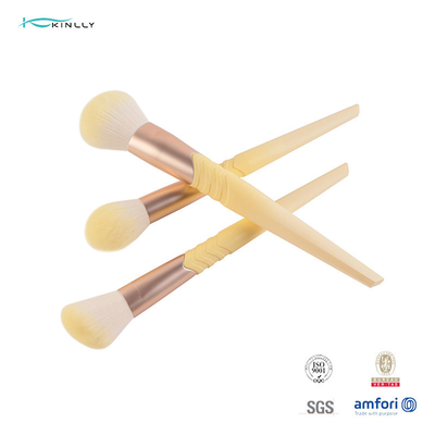 Le maquillage de luxe taillant d'olive balaye les cheveux synthétiques de la poignée 10pcs en plastique jaune