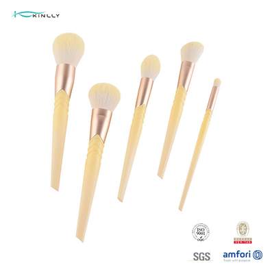 Le maquillage de luxe taillant d'olive balaye les cheveux synthétiques de la poignée 10pcs en plastique jaune