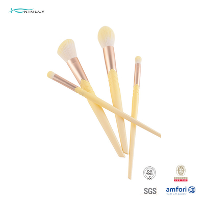 Le maquillage de luxe taillant d'olive balaye les cheveux synthétiques de la poignée 10pcs en plastique jaune