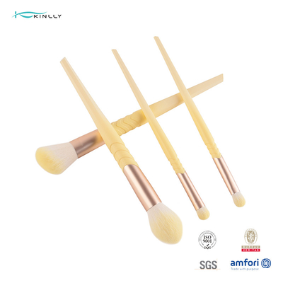Le maquillage de luxe taillant d'olive balaye les cheveux synthétiques de la poignée 10pcs en plastique jaune
