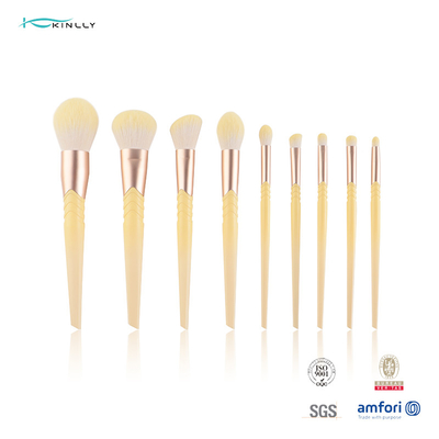 Le maquillage de luxe taillant d'olive balaye les cheveux synthétiques de la poignée 10pcs en plastique jaune